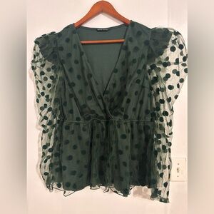 Green polka dot top